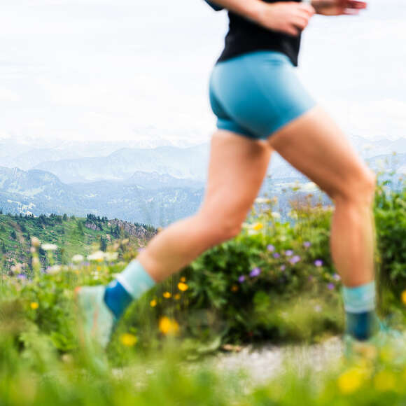 Läuferin auf einem Trailrun im Naturpark Nagelfluhkette